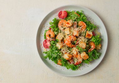 caesar salad, with shrimp, on a white background, homemade, no people,