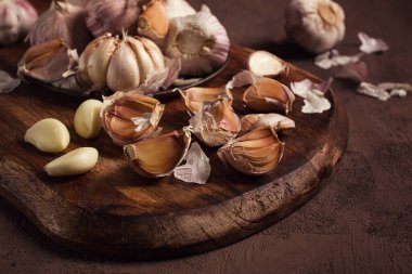 Fresh garlic, on a dark background, top view, food concept,