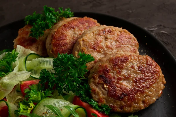 stock image Fried cutlets, turkey, with vegetable salad, top view, no people,