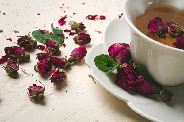 stock image cup of tea, damask rose, pink tea, close-up,