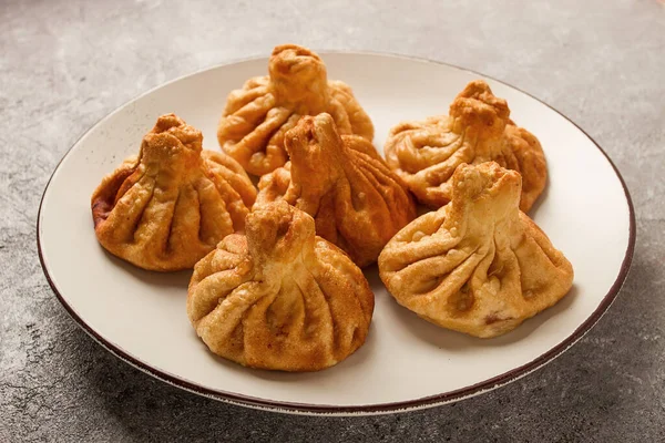 Stock image Deep-fried khinkali, khinkali with meat, traditional Georgian dish, no people,