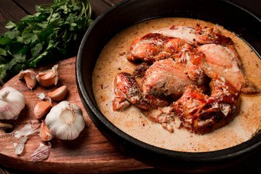 Shkmeruli, fried chicken, in milk-garlic sauce, Georgian cuisine, homemade, close-up, no people,