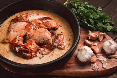 Shkmeruli, fried chicken, in milk-garlic sauce, Georgian cuisine, homemade, close-up, no people,