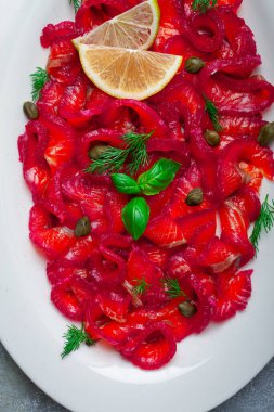 Salmon gravlax with beetroot, Scandinavian snack, beet gravlax, lightly salted fish, homemade, no people, clipart