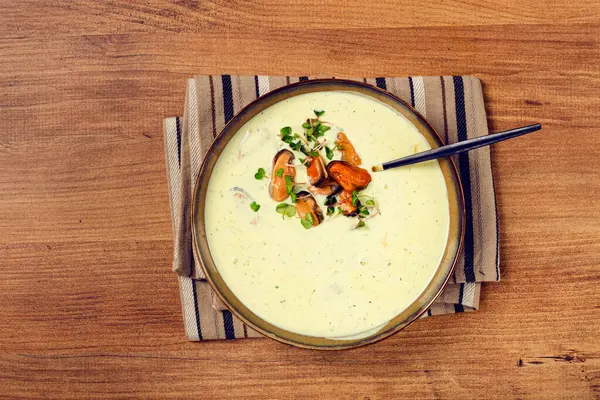 stock image creamy soup with mussels, mussels without shells, American cuisine, homemade, no people