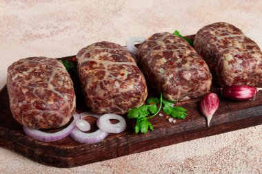 raw apkhazura, a dish of Georgian cuisine, meat balls, minced meat wrapped in a fat net, seftalia, homemade, no people, clipart