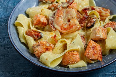 papardelle pasta in creamy sauce with seafood, homemade, no people, clipart