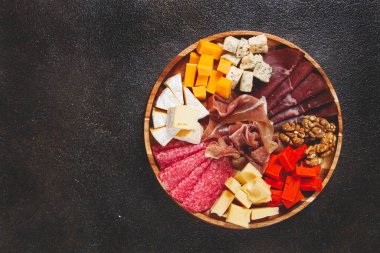 assortment of cheese meat cuts, on a plate, top view, no people, clipart