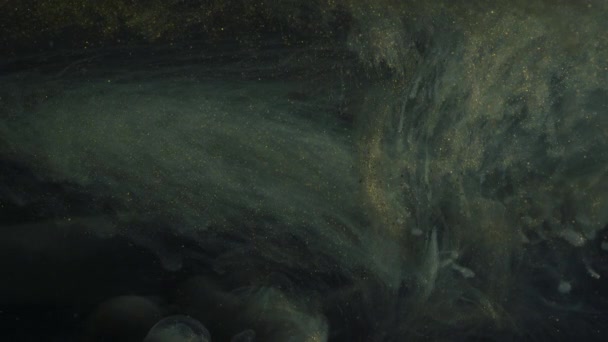 Зоряний Пил Частинки Золотий Блиск Виглядають Зірочка Космосі Чорнило Воді — стокове відео