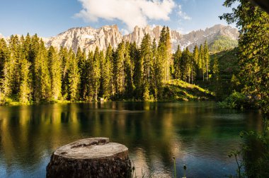 Beautiful scene at lago di Fusine. Summer scenery at lake Fusine in North Italy in the Alps. 