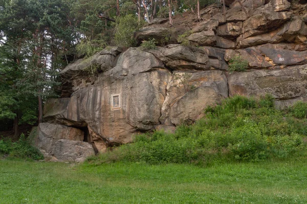 stock image stone in the forest in summer.The petrified city in Ciekowice