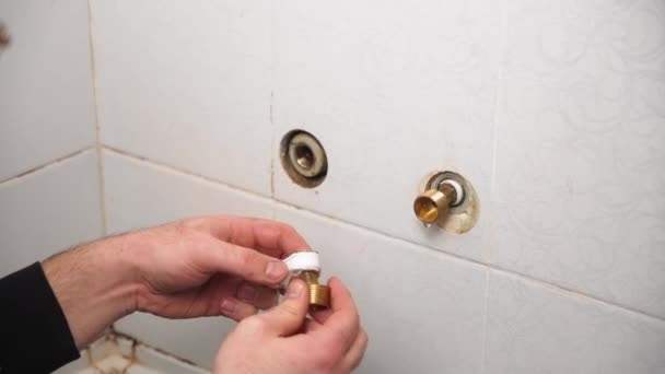 Man Wrapping Sealing Tape Fix Water Leak Screw Fitting Installing — Stock Video