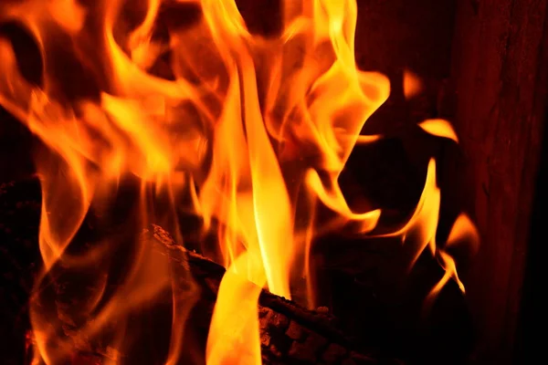Tűz Lángok Egy Fekete Háttér — Stock Fotó
