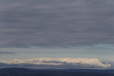 mountain landscape, the mountains and the trees, the clouds.