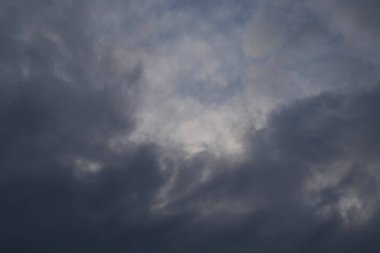 dramatic dark clouds on a cloudy sky. nature background