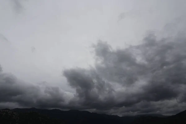 stock image storm clouds over the black sky