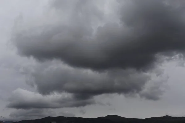 stock image storm clouds over the black sky