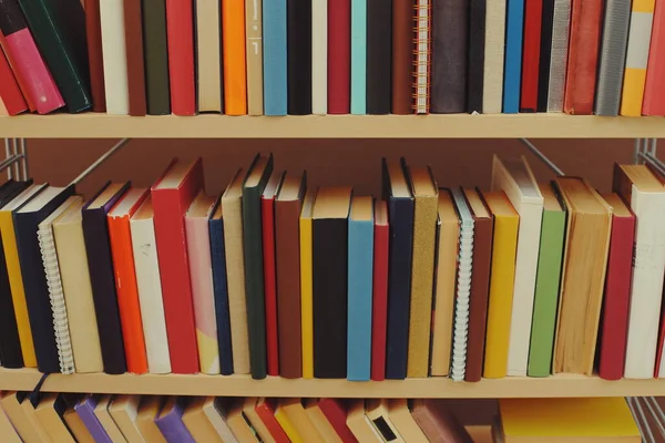 stock image stack of books on wooden table