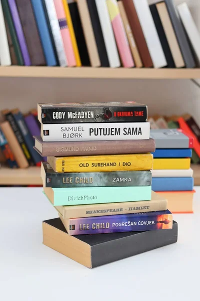 stock image Zagreb, Croatia, 13.04.2023.different types of books on wooden table