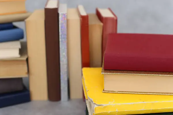 stock image stack of books on table, back view, close-up, space for text