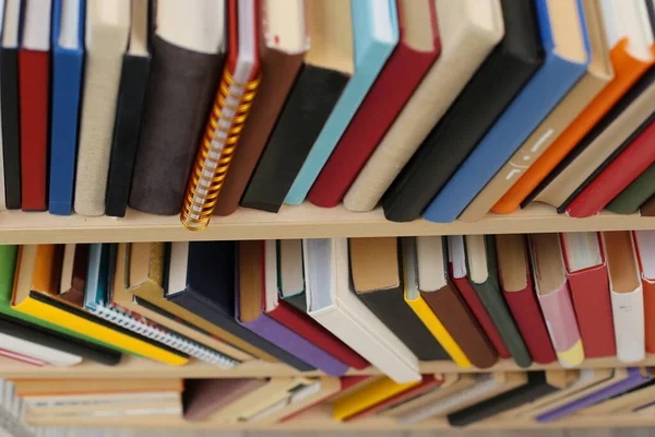 stock image stack of books on wooden table