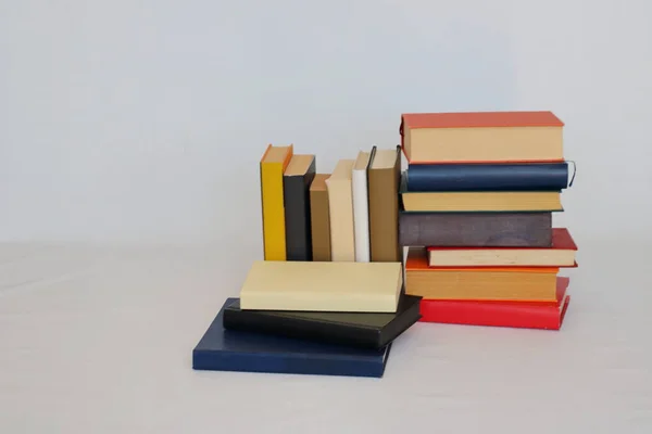 stack of books on a white background, copy space.