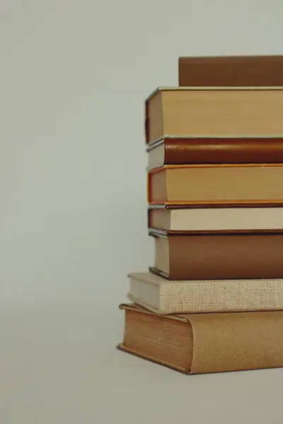 stock image stack of different books on wooden table_education concept