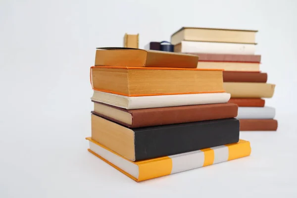stack of books on white background.