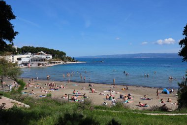 Hırvatistan 'ın Split kentindeki plajda 26,07,2023 kişi bulunuyor.