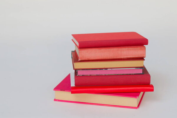 colorful books on the white background.