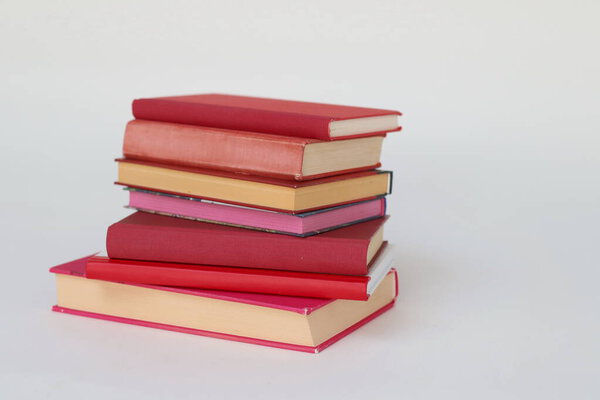 stack of books on white