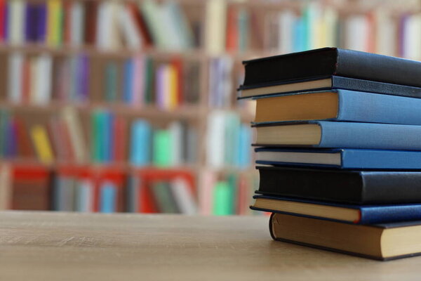 stack of books, library background