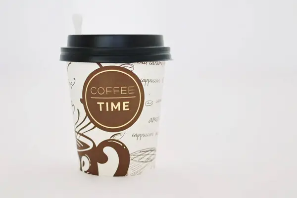 coffee paper cup on white table