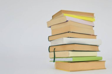 stack of colorful books on white background. education background. school books. clipart