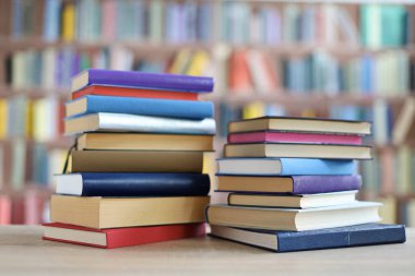 pile of books in the library