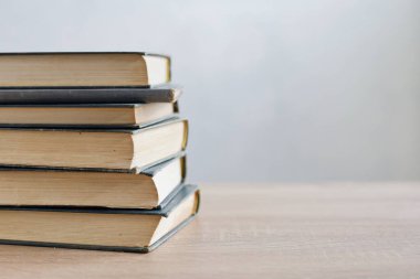pile of books in the library.