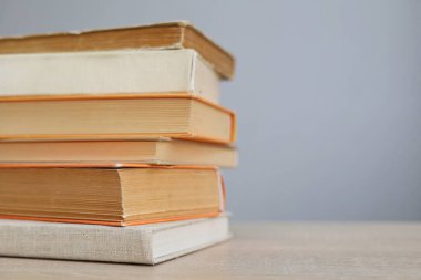 pile of books in the library