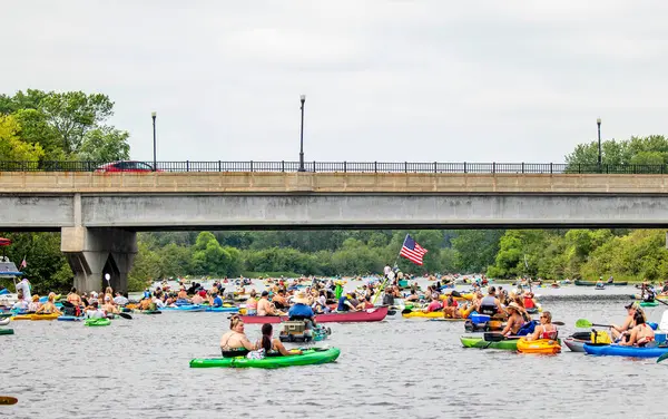 stock image Wausau, Wisconsin, USA - July, 27, 2024: 10th annual paddle pub crawl on Lake Wausau, horizontal