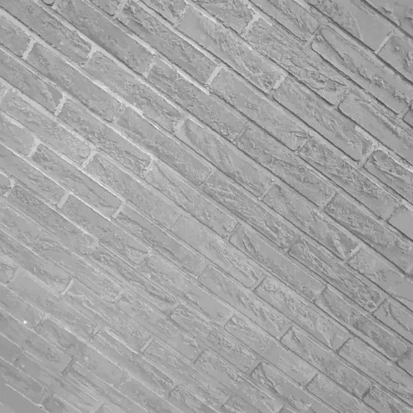 斜めの方向のベクトル グレーの煉瓦の壁 モノクロのテクスチャーされた背景 — ストックベクタ