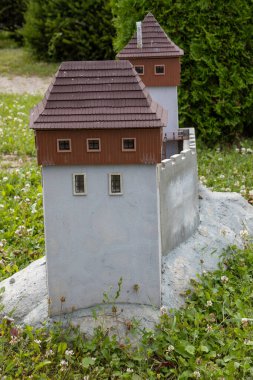 Exact miniature copy of the historical Black Castle. Miniatures park where are important slovak sights. Podolie, Slovakia. clipart