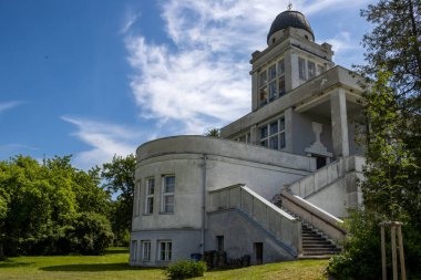 Evangelical church built in style of purism. Large staircase and many windows. Dome on the tower is rotatable. Surrounded by fresh greenery. Hrabova, Moravia (Morava), Czech republic. clipart