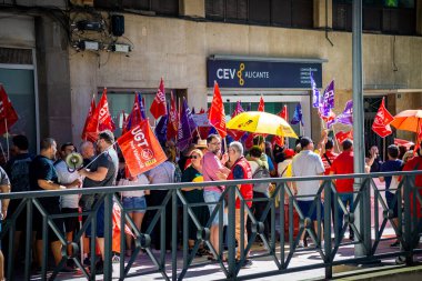 Alicante, Spain - September 26th 2024. Workers demonstrate in front of the employers' headquarters to demand a reduction of the working week to 37.5 hours. Trade unions CCOO and UGT. High quality photo clipart