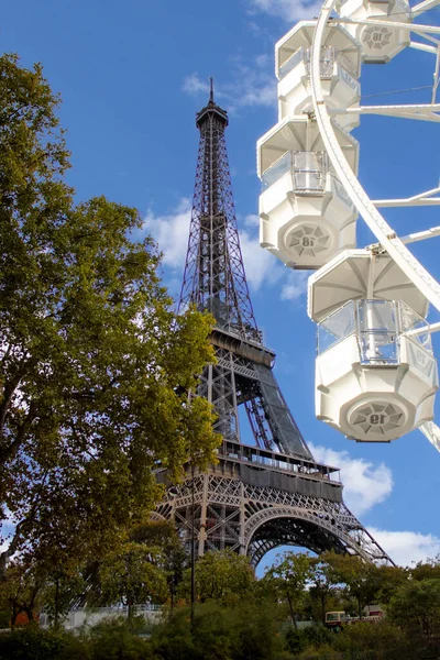 France, Paris, Rivoli. Collage. Big Ferris Wheel, Eiffel Tower in Paris. An Ideal Place to Relax with Family and Couples in Love.