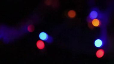 Çok renkli Lights 'ı. Parlayan Işıklar Arkaplanı. Soyut Bokeh Arkaplan Döngüsü.