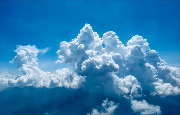 Clouds From a Bird's Eye View. Aerial Photography of Blue Sky with Fantastic Clouds.