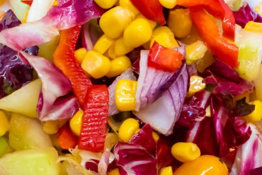 Vegetable Salad with Corn Close-up. View From Above. Diet Food. Vitamins on Our Table.