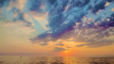 Fantastic View of the Ocean, Sea. Beautiful Golden Sunset and Clouds. Natural Background.
