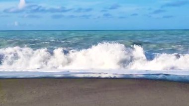 Wide View of the Blue Ocean Falling on the Beach. South Sea Waves Hit the Shore. Natural Seascape.