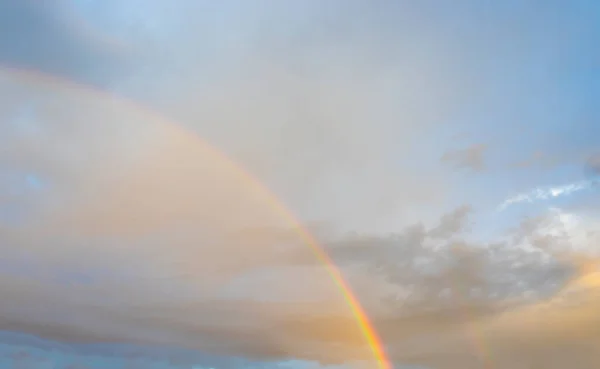 Beautiful rainbow. Sky and rainbow background.