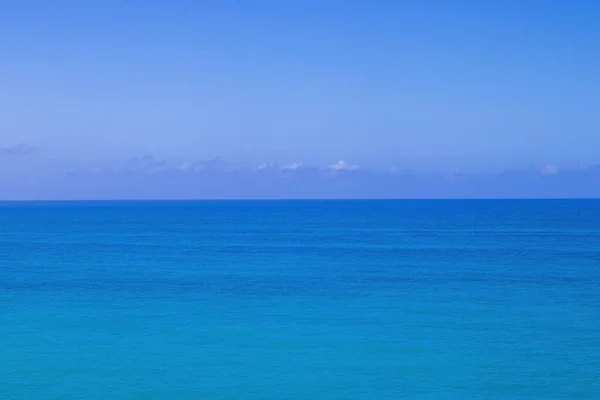 Idyllic Abstract Background, Horizon Line Between Calm Sea and Clear Blue Sky. Perfect Sky and Water of Ocean.